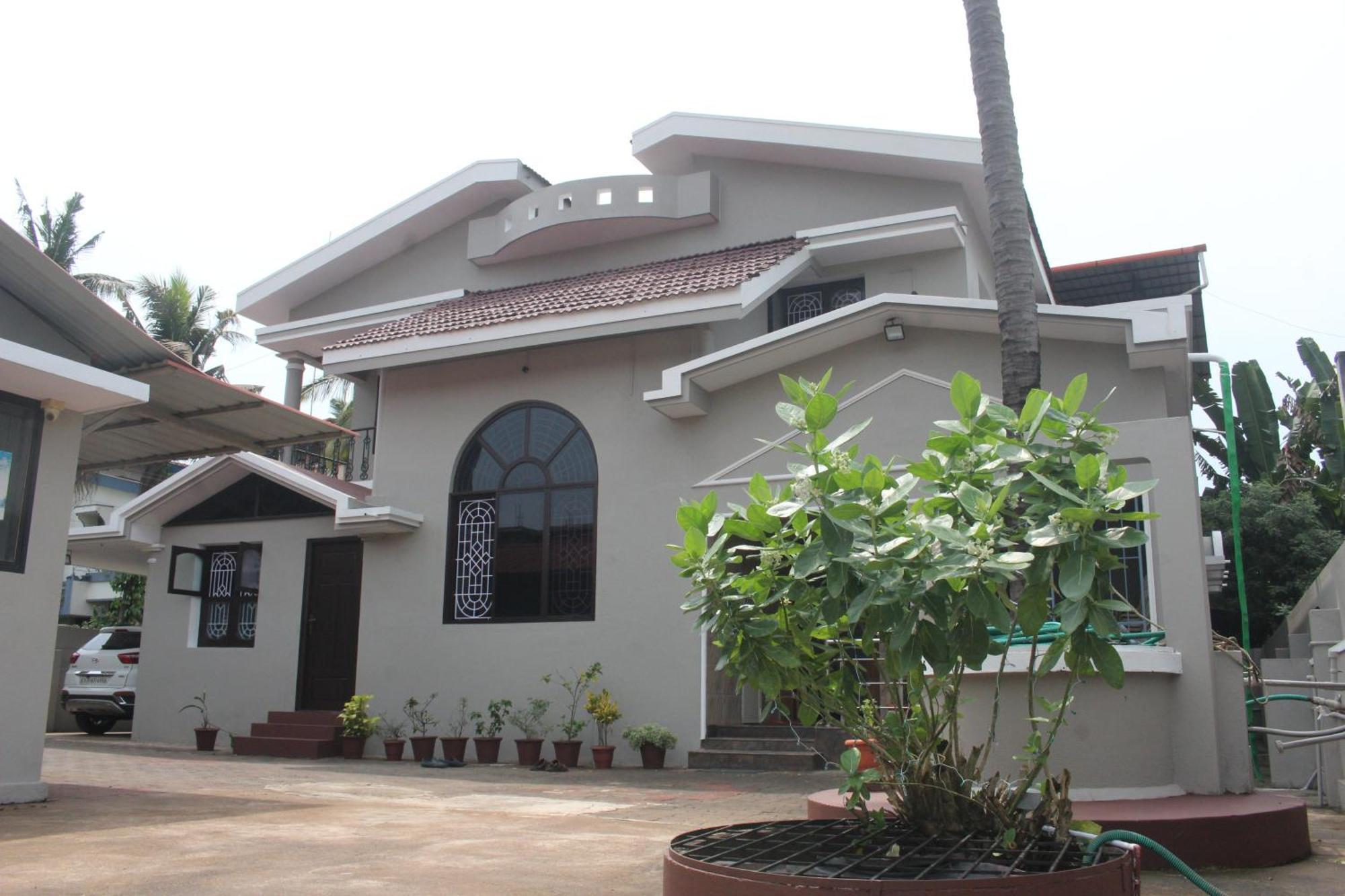 Tropical Villa Homestay منغالور المظهر الخارجي الصورة